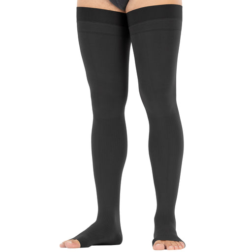 anthracite compression stockings worn by a person on a white background